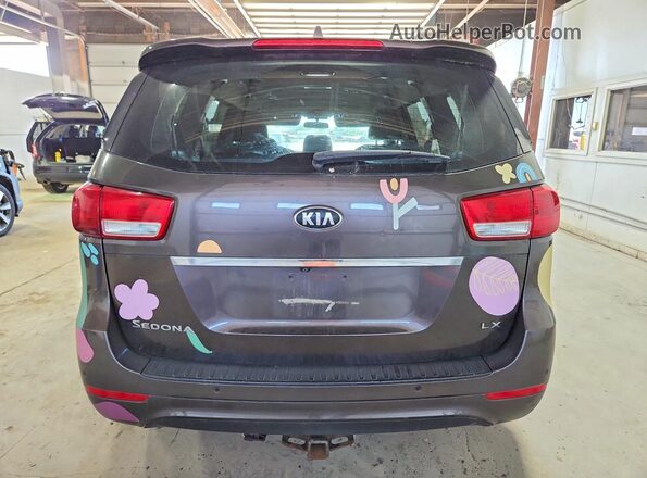 KNDMB5C18H6340101 2017 KIA SEDONA Gray Vista trasera
