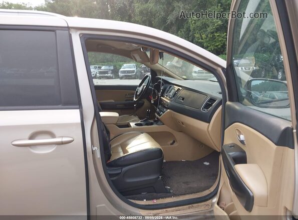 KNDMB5C19H6242727 2017 KIA SEDONA Gold Вид салону спереду