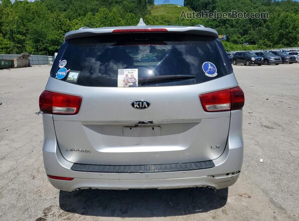 KNDMB5C1XG6094831 2016 KIA SEDONA Silver Вид ззаду