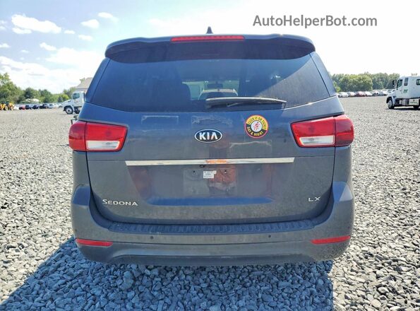 KNDMB5C1XG6171696 2016 KIA SEDONA Gray Հետևի տեսք