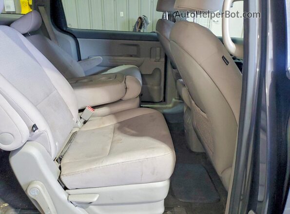 KNDMB5C1XG6185839 2016 KIA SEDONA Gray უკანა სალონის ხედი
