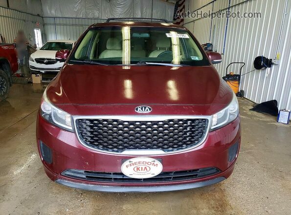 KNDMB5C1XG6199112 2016 KIA SEDONA Burgundy Widok z przodu