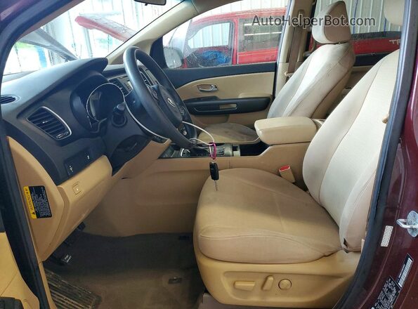 KNDMB5C1XG6199112 2016 KIA SEDONA Burgundy Widok wnętrza z przodu