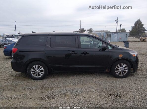 KNDMB5C1XH6230358 2017 KIA SEDONA Black Rear interior view
