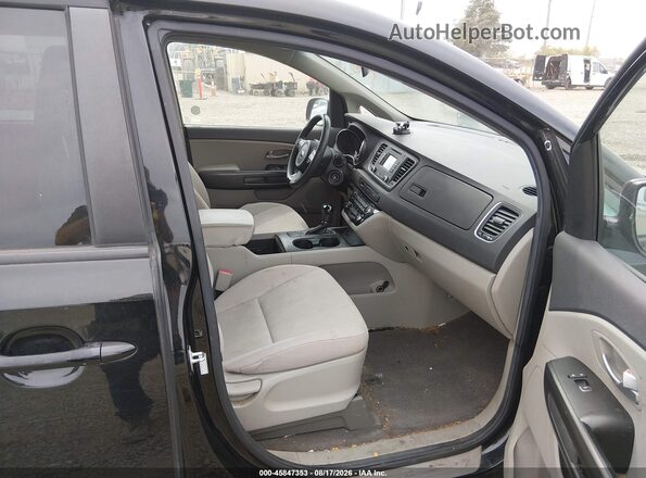 KNDMB5C1XH6230358 2017 KIA SEDONA Black Front interior view