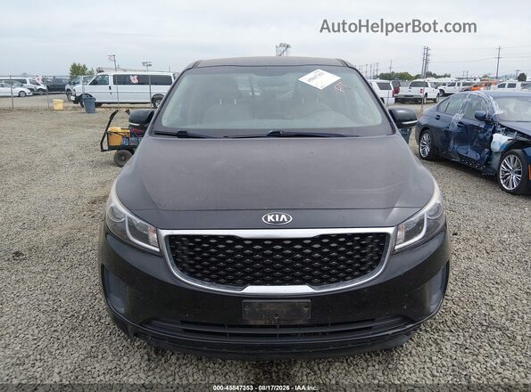 KNDMB5C1XH6230358 2017 KIA SEDONA Black Front view