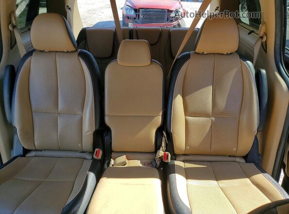 KNDMB5C1XH6321033 2017 KIA SEDONA Burgundy Rear seats view