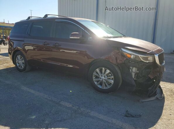 KNDMB5C1XH6321033 2017 KIA SEDONA Burgundy Front right