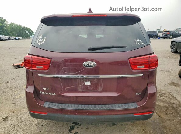 KNDMB5C1XK6535463 2019 KIA SEDONA Maroon Հետևի տեսք