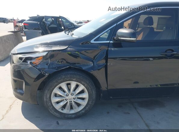 KNDMC5C10G6146965 2016 KIA SEDONA Black Front view