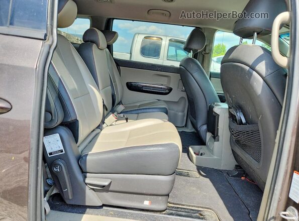 KNDMC5C11G6137501 2016 KIA SEDONA Brown Вид задньої частини салону