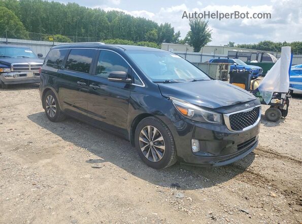KNDMC5C11G6141452 2016 KIA SEDONA Charcoal Front right