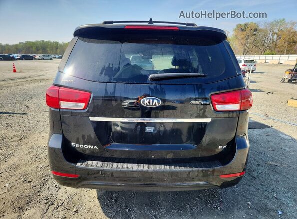 KNDMC5C13G6139475 2016 KIA SEDONA Черный Вид сзади