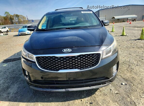 KNDMC5C13G6139475 2016 KIA SEDONA Черный Вид спереди