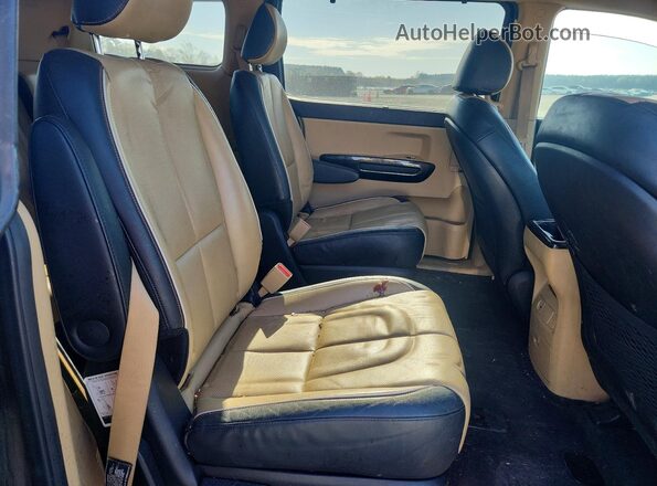 KNDMC5C13G6139475 2016 KIA SEDONA Черный Вид задней части салона