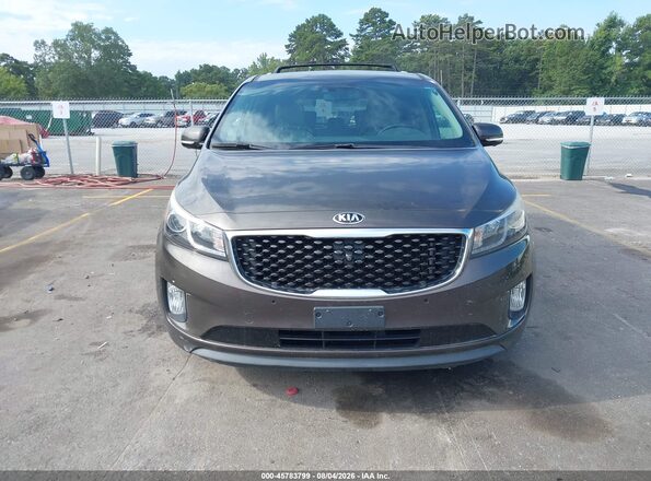 KNDMC5C13G6147480 2016 KIA SEDONA Brown Սարքավորումների վահանակի տեսք