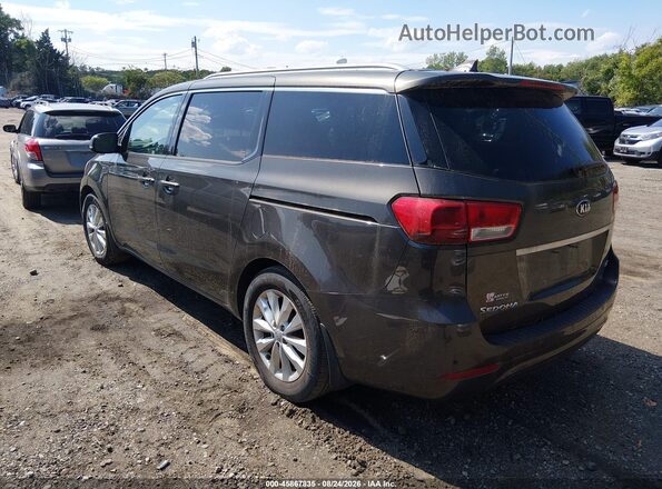 KNDMC5C15G6137520 2016 KIA SEDONA Brown Trasero izquierdo