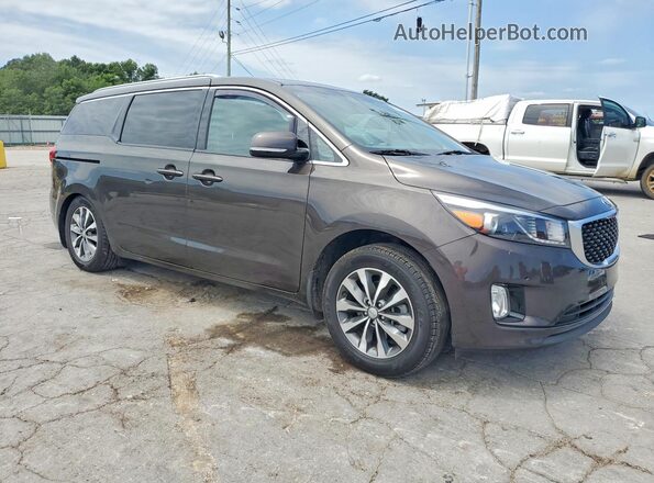 KNDMC5C16H6326470 2017 KIA SEDONA Brown Front right
