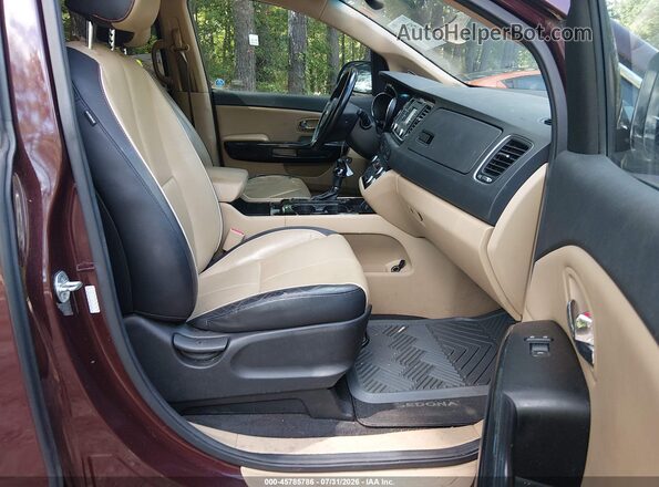 KNDMC5C19G6114533 2016 KIA SEDONA Maroon Widok wnętrza z przodu