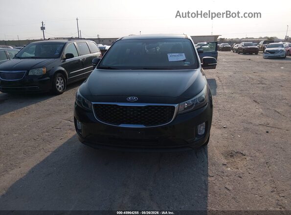 KNDMC5C1XG6175017 2016 KIA SEDONA Black Widok z przodu