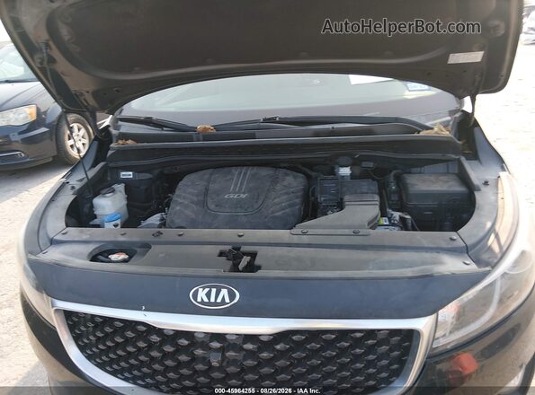 KNDMC5C1XG6175017 2016 KIA SEDONA Black Widok z tyłu
