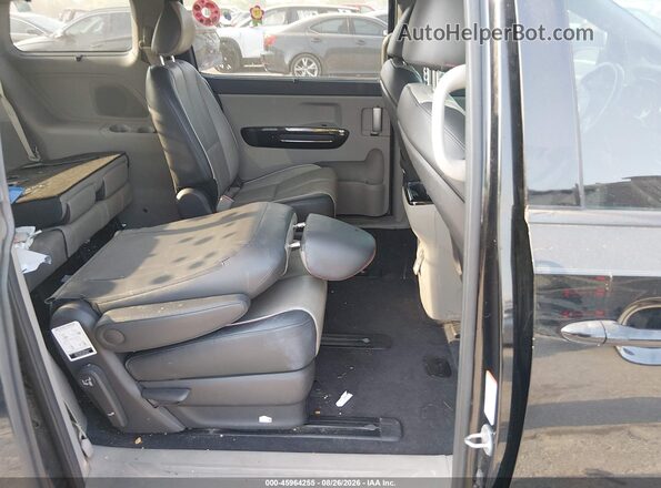 KNDMC5C1XG6175017 2016 KIA SEDONA Black Widok naklejki z numerem VIN