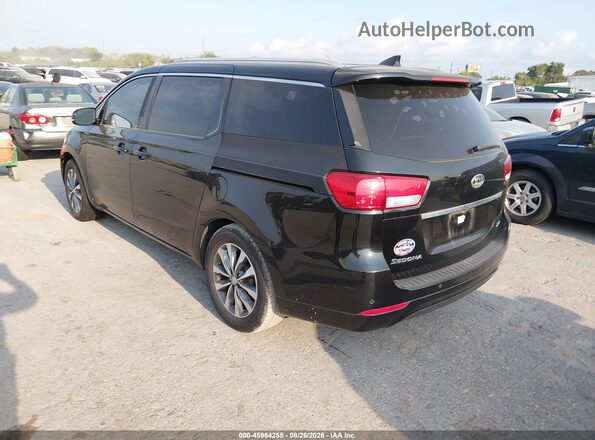 KNDMC5C1XG6175017 2016 KIA SEDONA Black Tył lewy