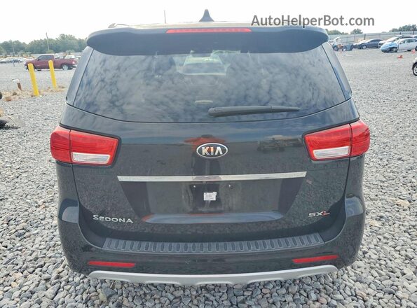 KNDME5C11G6171450 2016 KIA SEDONA Black Вид ззаду