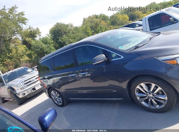 KNDME5C19G6142679 2016 KIA SEDONA Gray Rear interior view