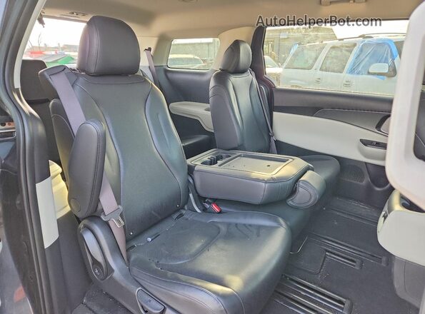 KNDNB4H33R6401199 2024 KIA CARNIVAL Charcoal Rear interior view
