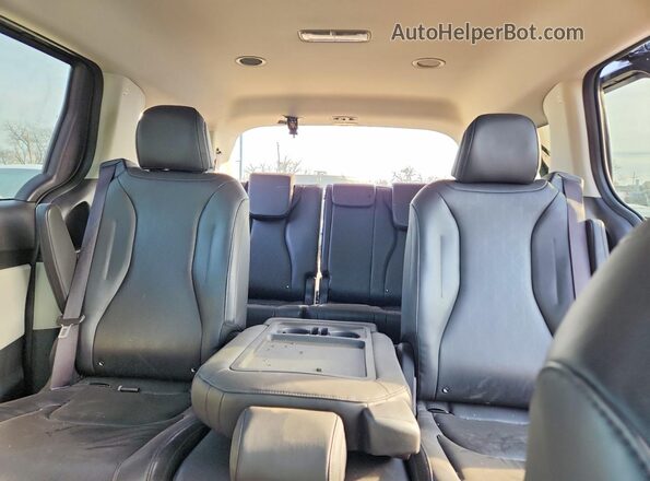 KNDNB4H33R6401199 2024 KIA CARNIVAL Charcoal Rear seats view