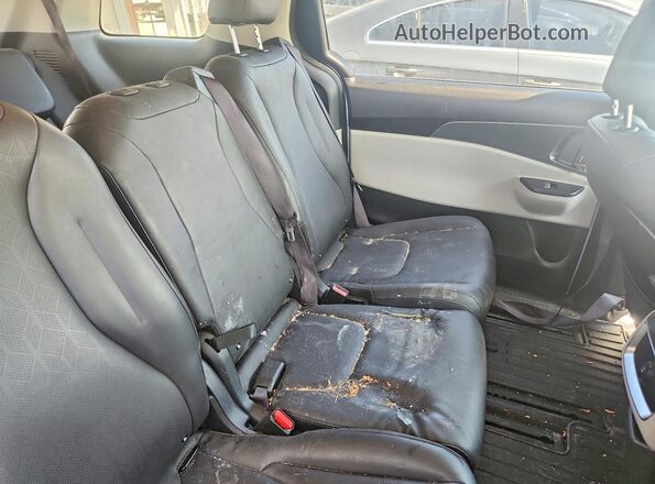 KNDNB4H34R6420991 2024 KIA CARNIVAL White Widok wnętrza z tyłu