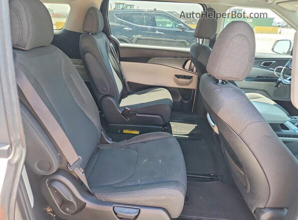KNDNB4H37N6131985 2022 KIA CARNIVAL White Widok wnętrza z tyłu