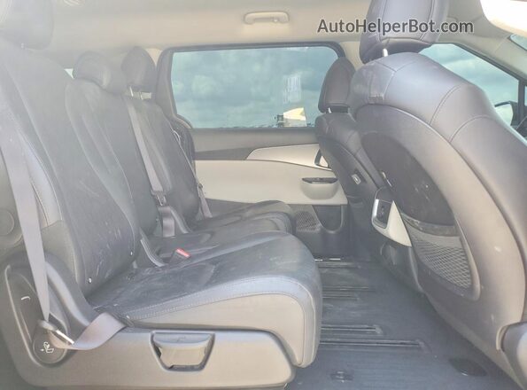 KNDNB4H37P6222774 2023 KIA CARNIVAL Black Вид задньої частини салону