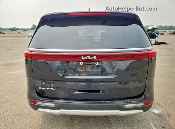 KNDNB4H38P6193799 2023 KIA CARNIVAL Black Հետևի տեսք