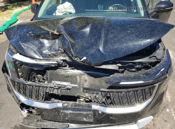KNDNB5K34T6600655 2026 KIA CARNIVAL Black Вид задньої частини салону