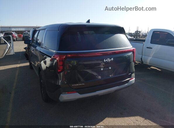 KNDNB5KA0T6127299 2026 KIA CARNIVAL MPV HYBRID Black Trasero izquierdo
