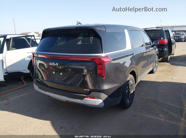 KNDNB5KA0T6127299 2026 KIA CARNIVAL MPV HYBRID Black Trasero derecho