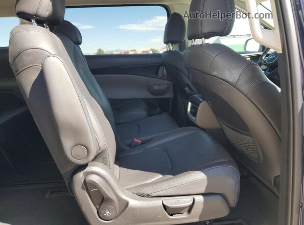 KNDNB5KA7T6128157 2026 KIA CARNIVAL Blue Rear interior view