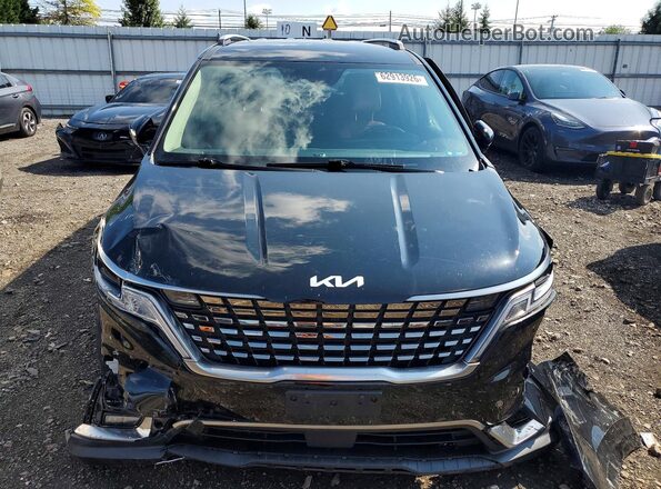 KNDNE5H37R6351985 2024 KIA CARNIVAL Black Front view