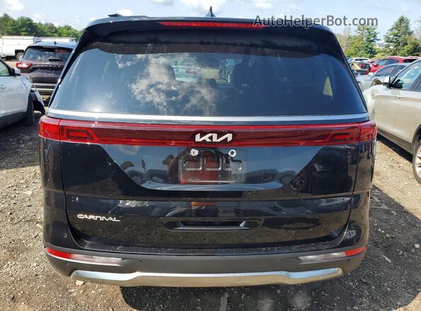 KNDNE5H37R6351985 2024 KIA CARNIVAL Black Rear view