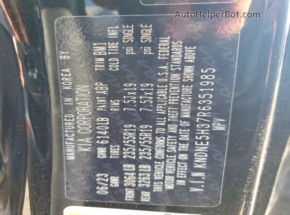 KNDNE5H37R6351985 2024 KIA CARNIVAL Black VIN sticker view