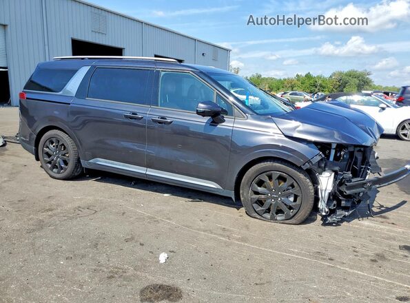 KNDNE5H39P6287333 2023 KIA CARNIVAL Charcoal Front right