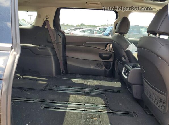 KNDNE5K30T6569752 2026 KIA CARNIVAL Black Rear interior view