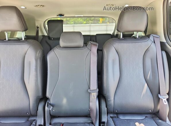 KNDNE5KA1S6039884 2025 KIA CARNIVAL White Vista de los asientos traseros