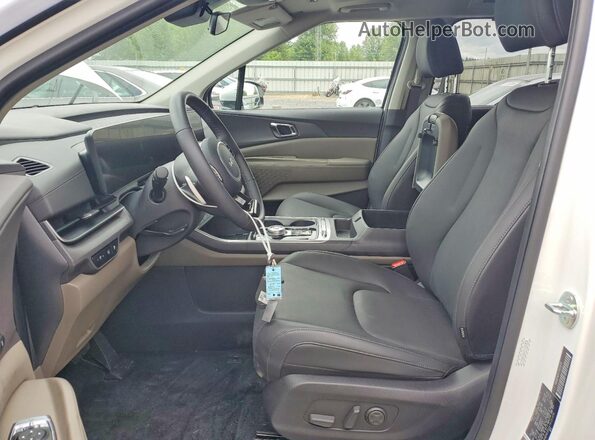 KNDNE5KA4T6101070 2026 KIA CARNIVAL Белый Вид салона спереди