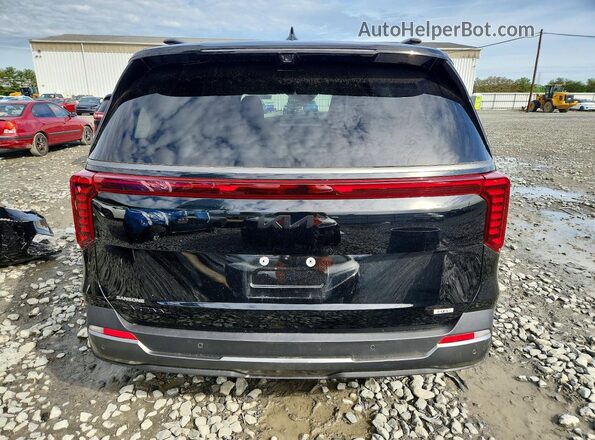 KNDNE5KA5S6030475 2025 KIA CARNIVAL Black Rear view