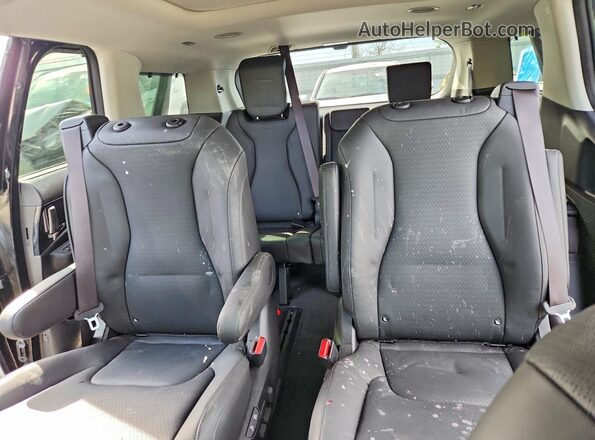 KNDNE5KA5S6030475 2025 KIA CARNIVAL Black Rear seats view