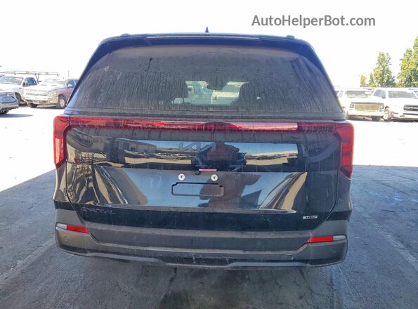 KNDNE5KA7S6079287 2025 KIA CARNIVAL Black Rear view