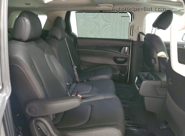 KNDNE5KA8T6117840 2026 KIA CARNIVAL White უკანა სალონის ხედი